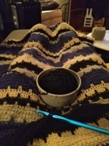 Repurposed sweater blanket